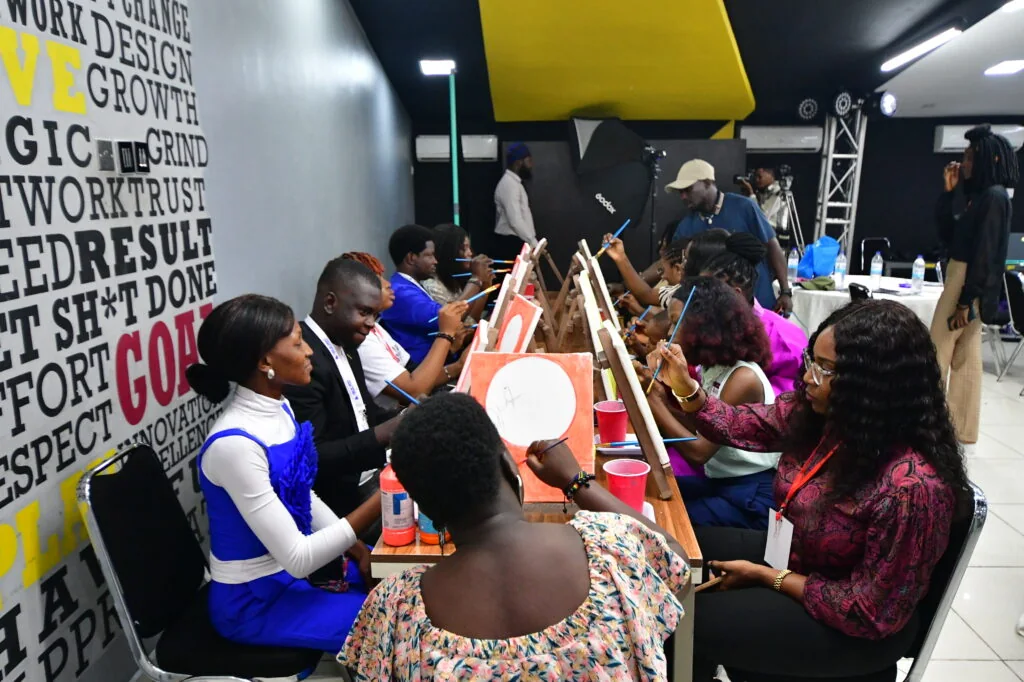 Participants painting during an FLI creative engagement